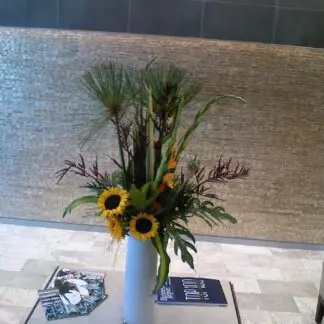 Tropical sensation in a tall white vase