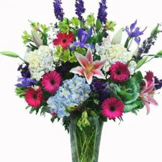 Tall vase mixed colorful flowers
